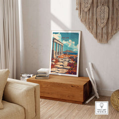 Delos Travel Print displayed in a cozy living room setting, inspiring wanderlust and adventure.