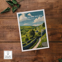 Derbyshire Dales Print - England Farmhouse Wall Art - Green Fields and Hills Poster on a wooden table with greenery