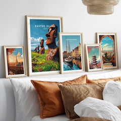 Easter Island Wall Art Poster collection displayed in stylish frames on a sofa, showcasing vibrant travel art.