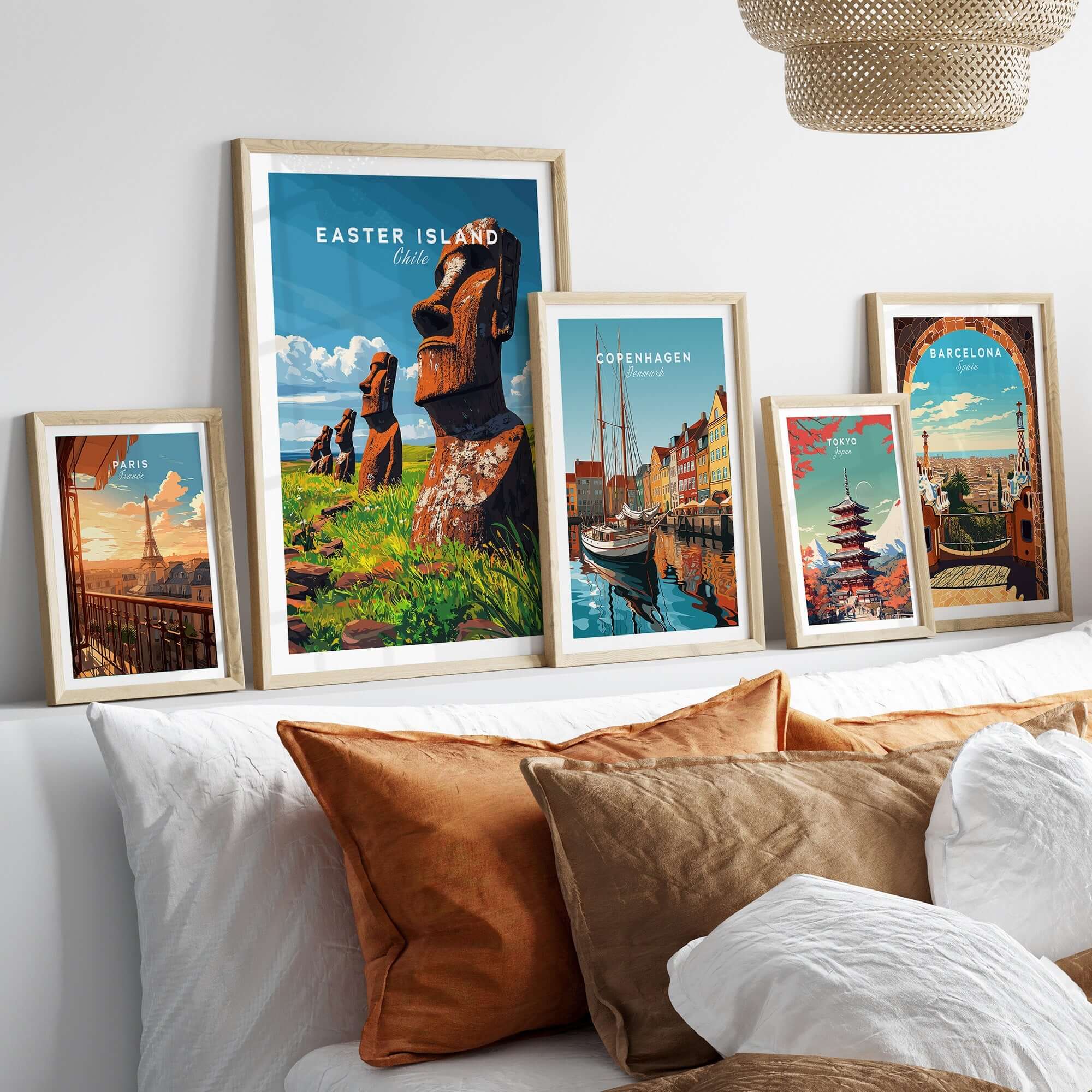 Easter Island Wall Art Poster collection displayed in stylish frames on a sofa, showcasing vibrant travel art.