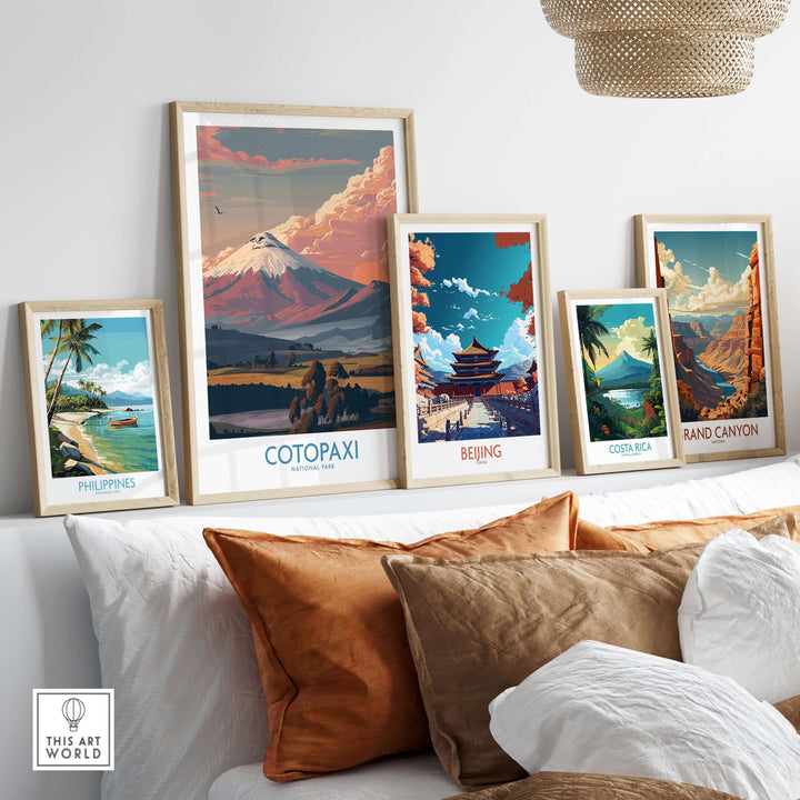 Ecuador sunset landscape poster of Cotopaxi volcano alongside framed travel art from various destinations.