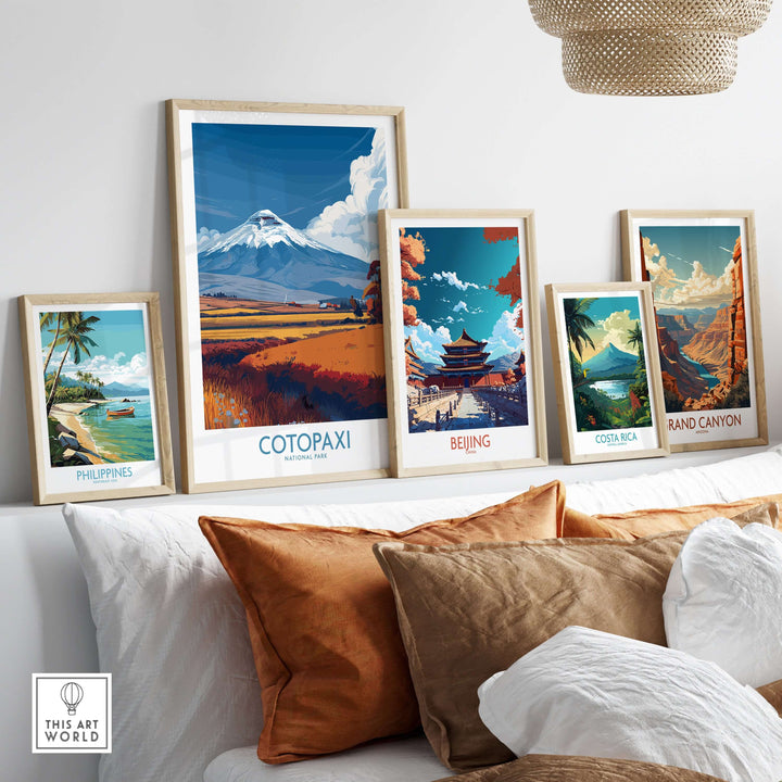Colorful travel posters including Cotopaxi, showcasing landscapes from around the world displayed in a cozy living room.