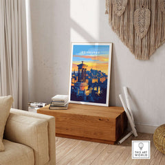 Edinburgh Travel Print showcasing the beauty of Edinburgh's architecture and sunset hues in a stylish living room setting.