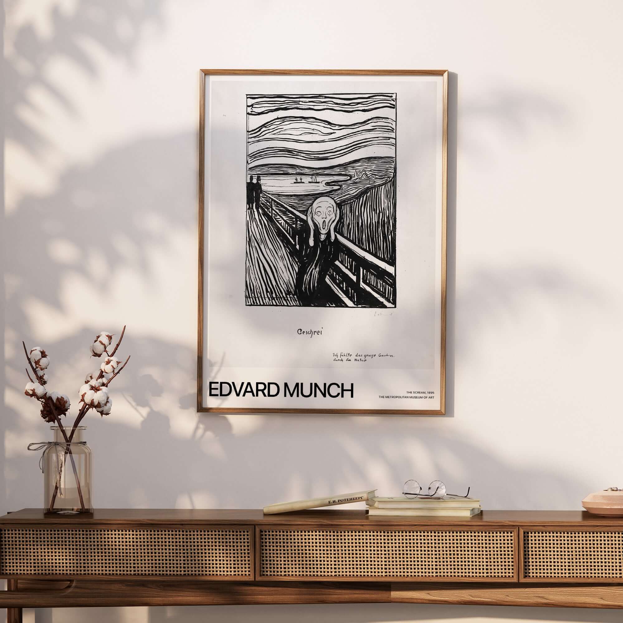 Edvard Munch The Scream 1895 Lithograph Art Print Expressionist Poster framed on a wall above a wooden console.