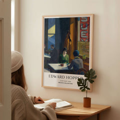 Edward Hopper Chop Suey 1929 Art Print Poster - Urban Restaurant Scene displayed in a cozy setting.