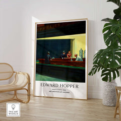 Edward Hopper Nighthawks 1942 Iconic Diner Art Print AIC Poster displayed in a stylish interior.