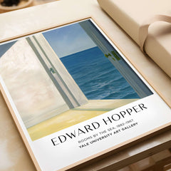 Edward Hopper Rooms by the Sea 1951 Yale University Art Print Poster displayed with a beach view.