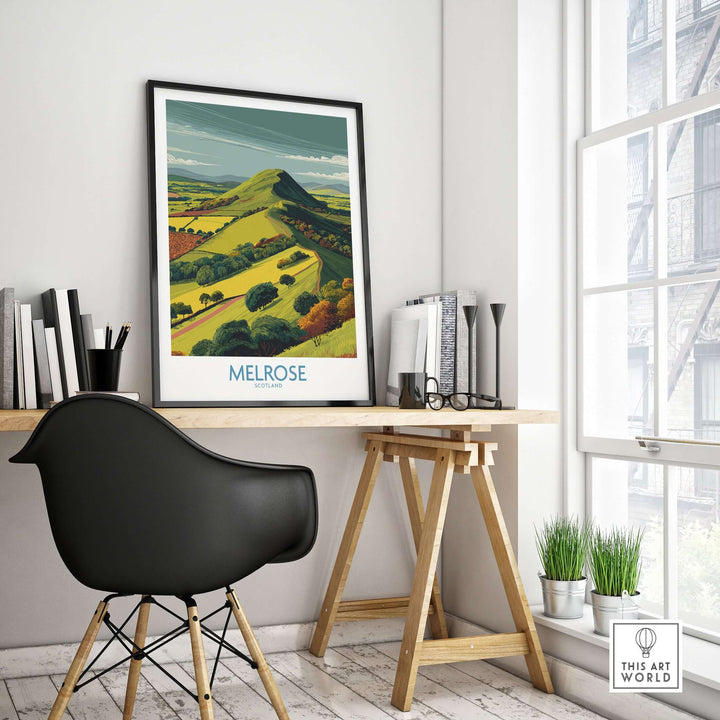 Modern wall art print of Eildon Hills in Melrose, Scotland, displayed in a stylish office setting.