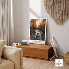 Eindhoven Netherlands Art Print | Autumn Cityscape Poster displayed in a cozy living room setting with warm autumn hues.