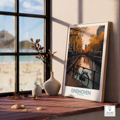 Eindhoven Netherlands Art Print | Autumn Cityscape Poster showcasing a vibrant autumn scene with a bicycle by the canal.