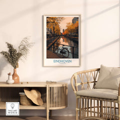 Eindhoven Netherlands Art Print | Autumn Cityscape Poster showcasing a canal and bicycles in a cozy interior setting.
