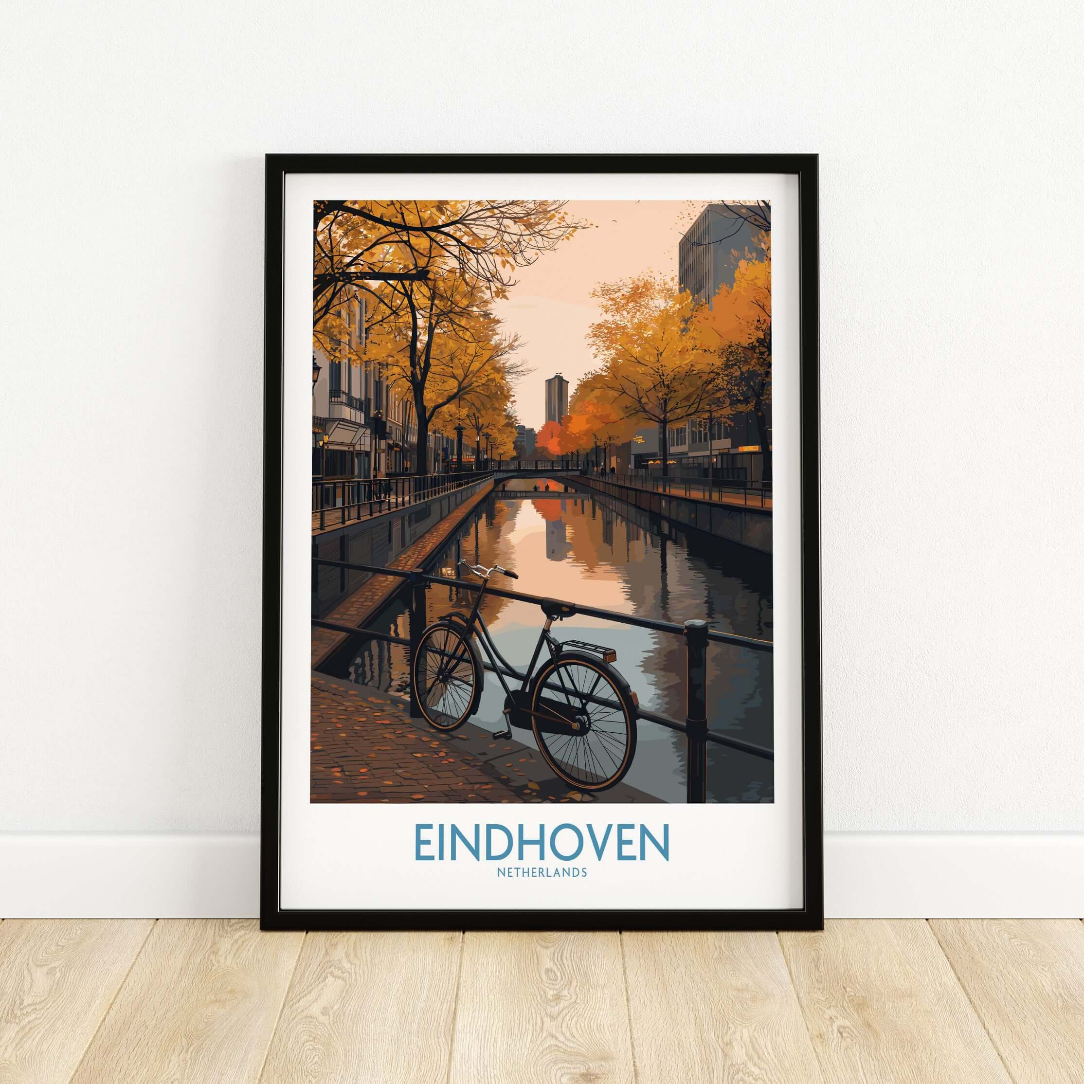 Eindhoven Netherlands Art Print | Autumn Cityscape Poster featuring a bicycle by a canal in autumn.