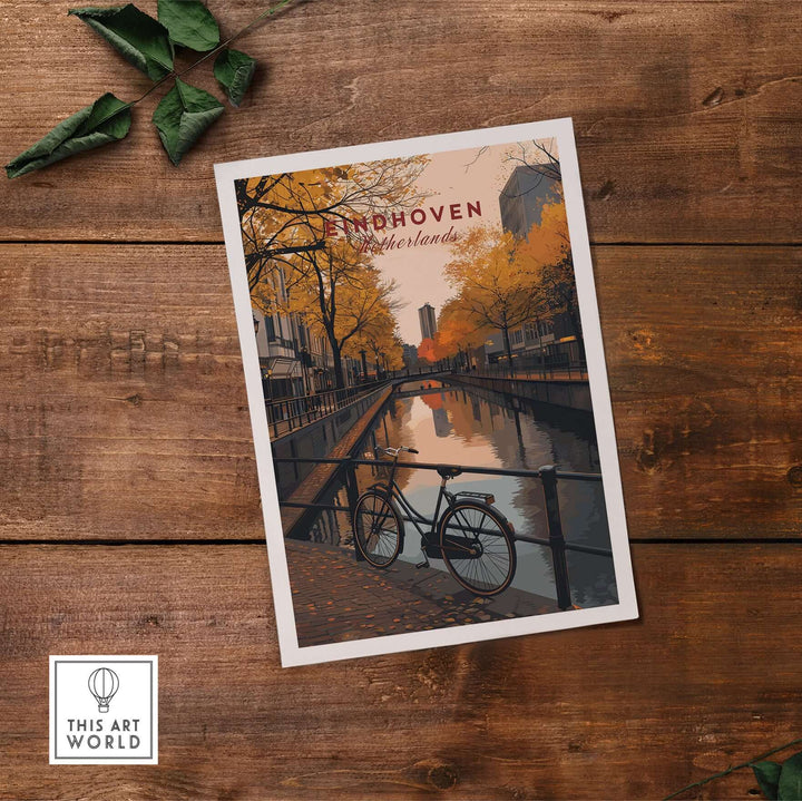 Eindhoven Print | Netherlands Home Decor Walll Art featuring a cityscape with a bicycle by the canal.
