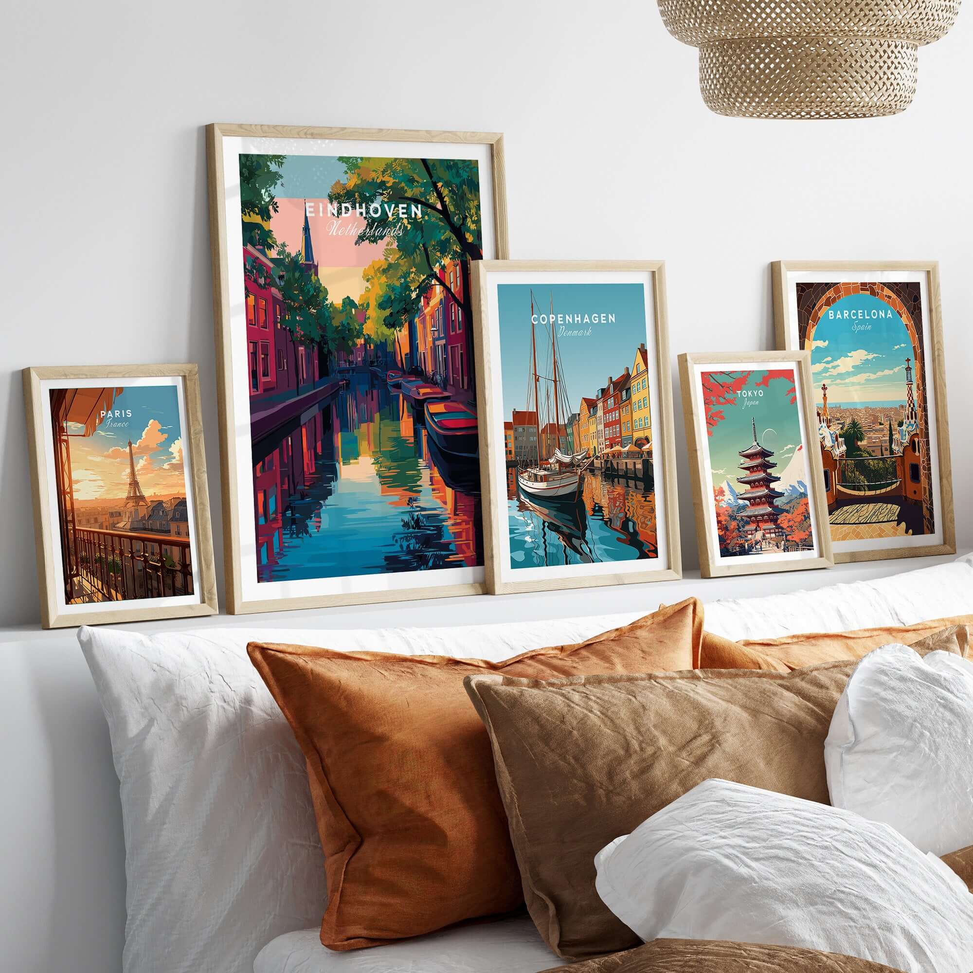Eindhoven Print | Netherlands Travel Wall Art displayed among other framed city prints in a stylish living room.