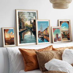 Eindhoven Print | Dutch City Wall Decor displayed among other city prints on a stylish sofa.