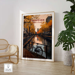 Eindhoven Print | Netherlands Home Decor Walll Art featuring a bike by a canal in autumn setting.