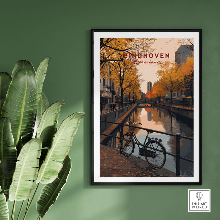 Eindhoven Print | Netherlands Home Decor Walll Art showcasing a bicycle by a canal with autumn foliage.