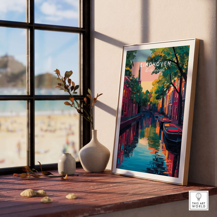 Eindhoven Print | Netherlands Travel Wall Art displayed in a cozy interior, showcasing colorful architecture and serene waterways.