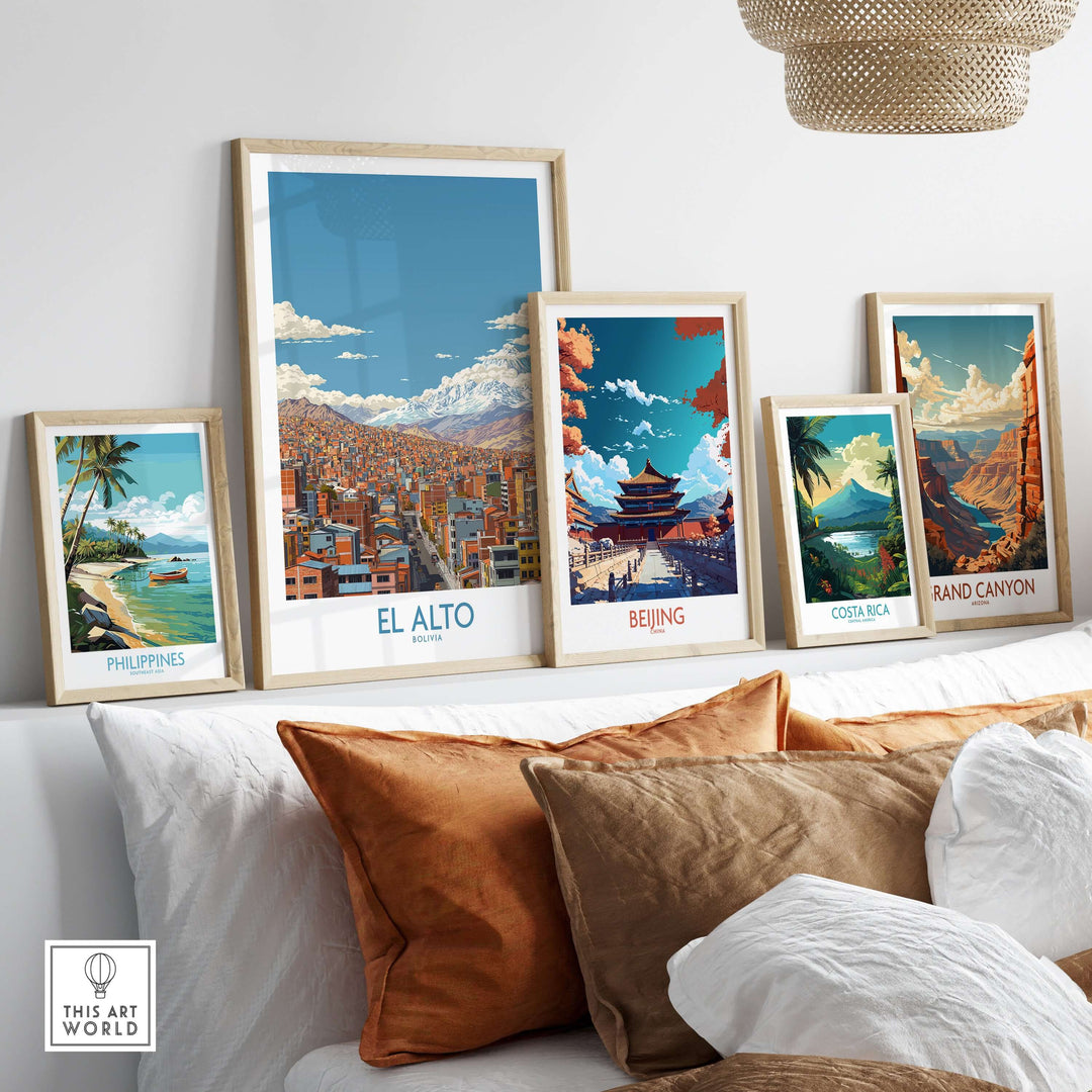 Collection of travel art prints featuring El Alto, Beijing, Costa Rica, and Grand Canyon displayed on a decorative shelf.