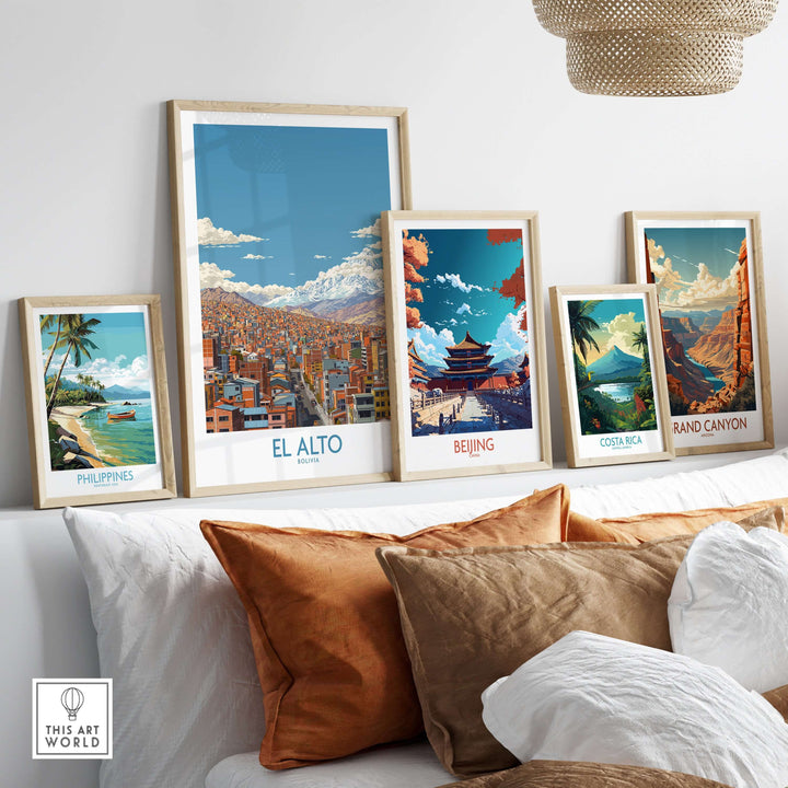 Collection of travel art prints featuring El Alto, Beijing, Costa Rica, and Grand Canyon displayed on a decorative shelf.