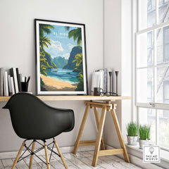 El Nido Travel Print displayed in a stylish home office setting with tropical beach artwork.