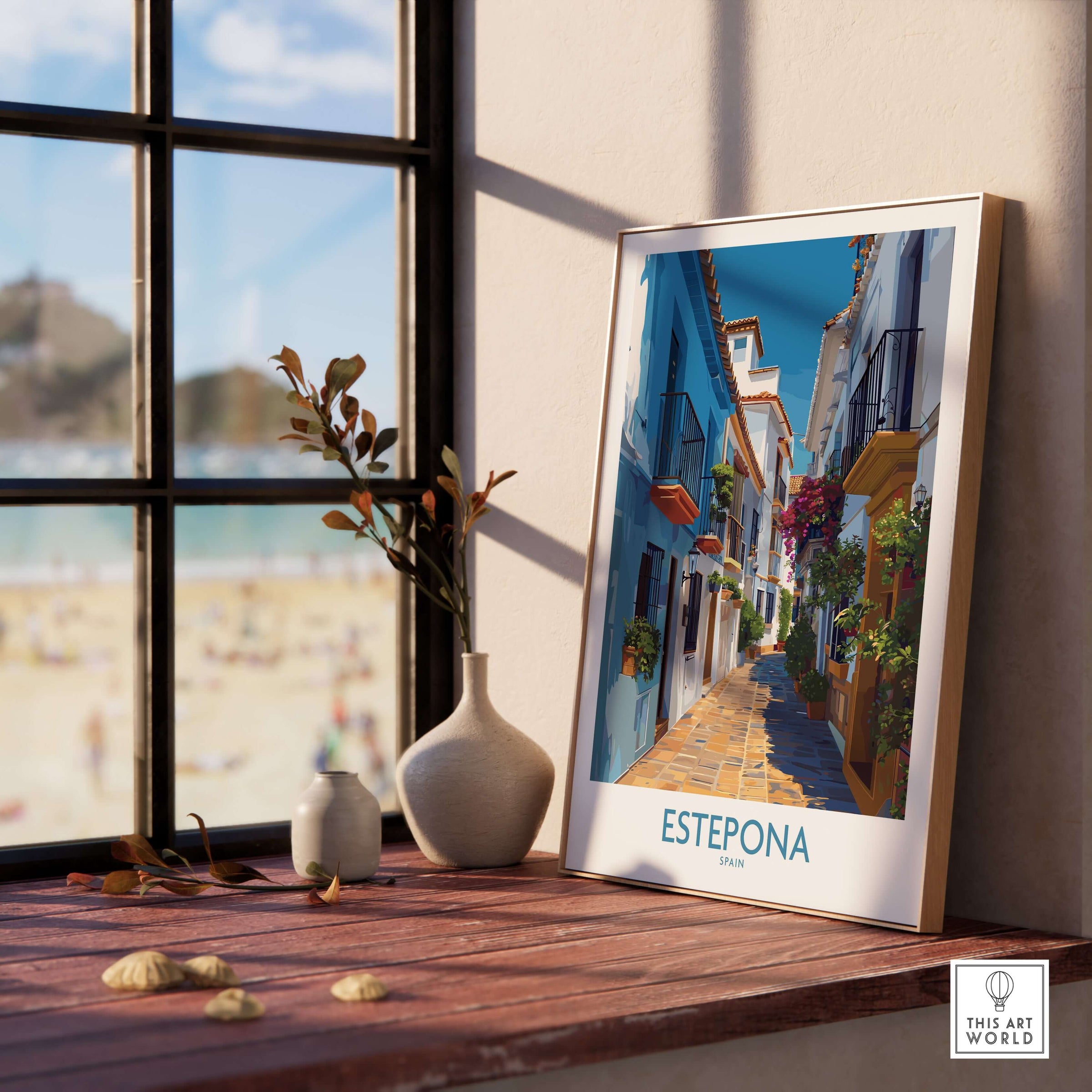 Estepona Spain Art Print | Spanish Architecture Poster displayed in a sunlit room with a beach view.