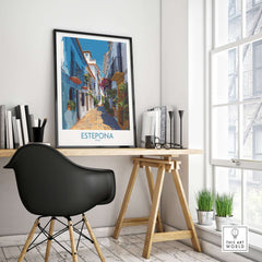 Estepona Spain Art Print | Spanish Architecture Poster displayed in a modern workspace with plants and books.
