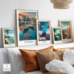 Estepona Spain Sunset Marina Art Print | Andalusian Coastal Poster displayed among travel art prints on a cozy couch.