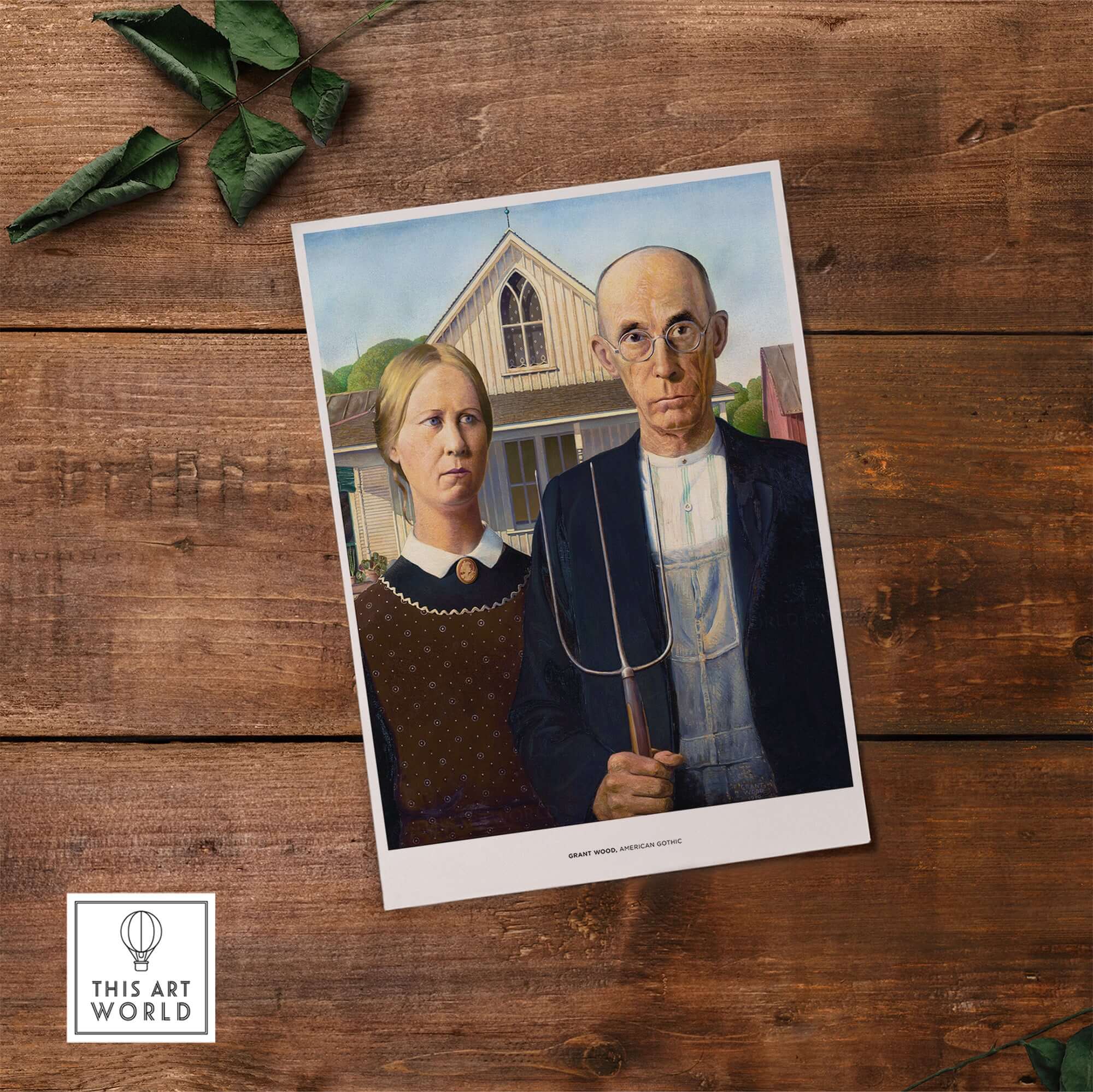 Exhibition Art Print American Gothic Grant Wood Famous Painting Wall Art Poster displayed on a wooden surface.