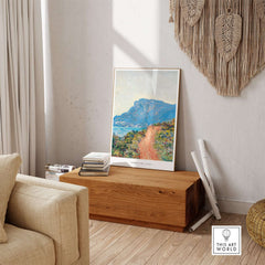 Exhibition Art Print Claude Monet The Corniche near Monaco Impressionist Landscape Poster displayed in a stylish living room.