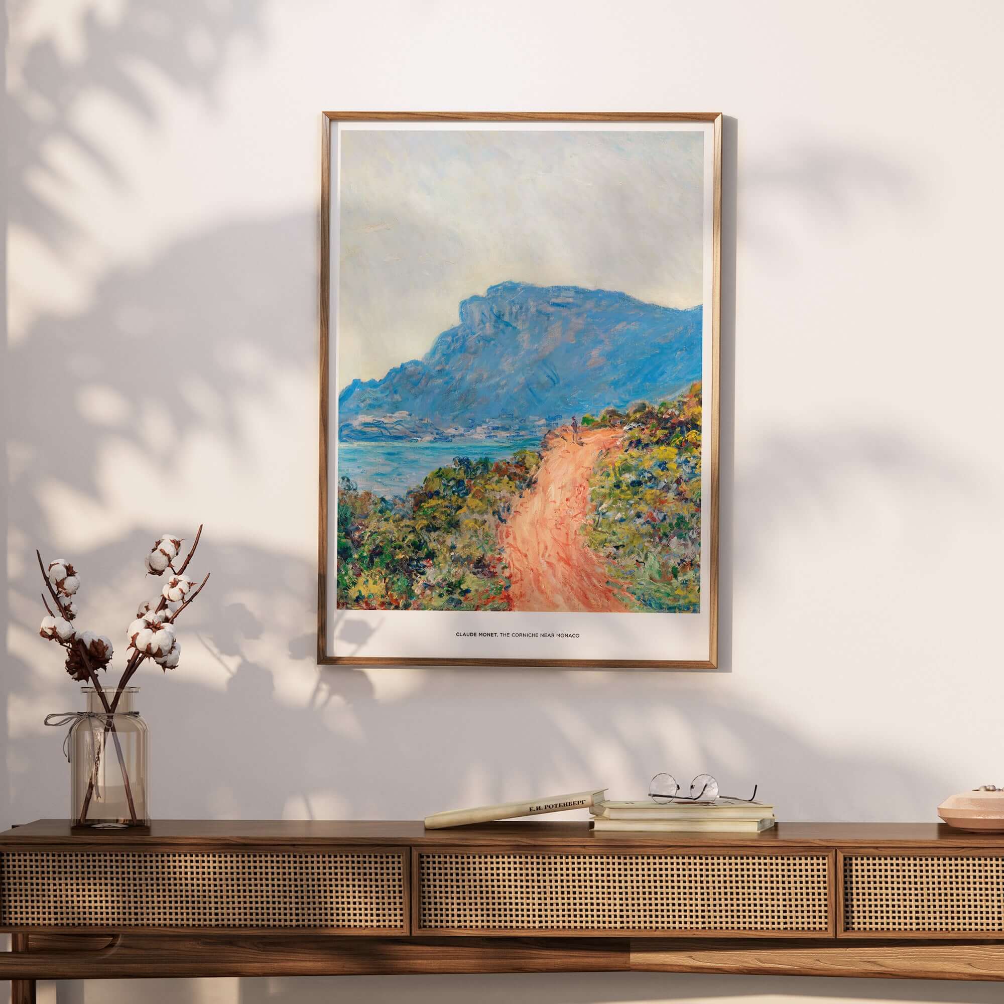 Exhibition Art Print Claude Monet The Corniche near Monaco Impressionist Landscape Poster displayed in a stylish interior setting.