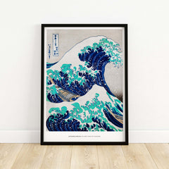 Exhibition Art Print Hokusai The Great Wave off Kanagawa Japanese Ukiyo-e Poster framed on a wall showcasing dynamic ocean waves.