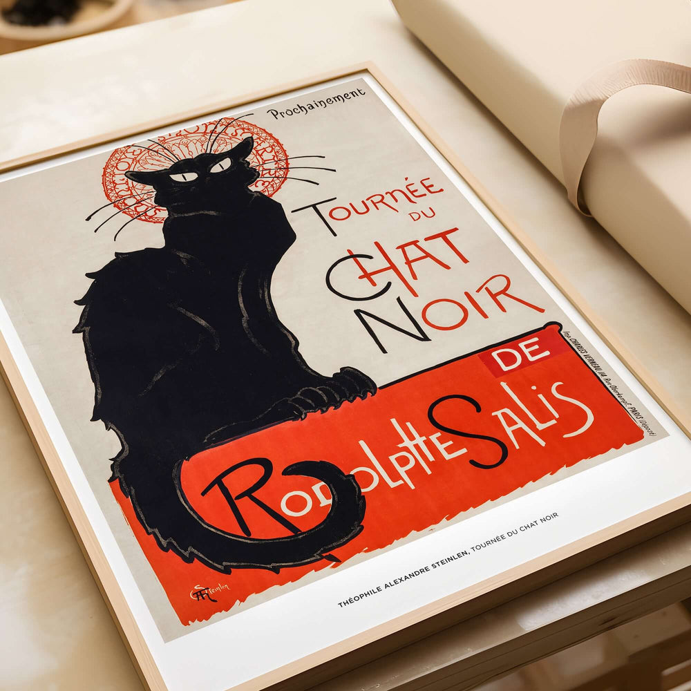 Exhibition Art Print Steinlen Tournée du Chat Noir Vintage French Black Cat Poster displayed with a wooden frame.