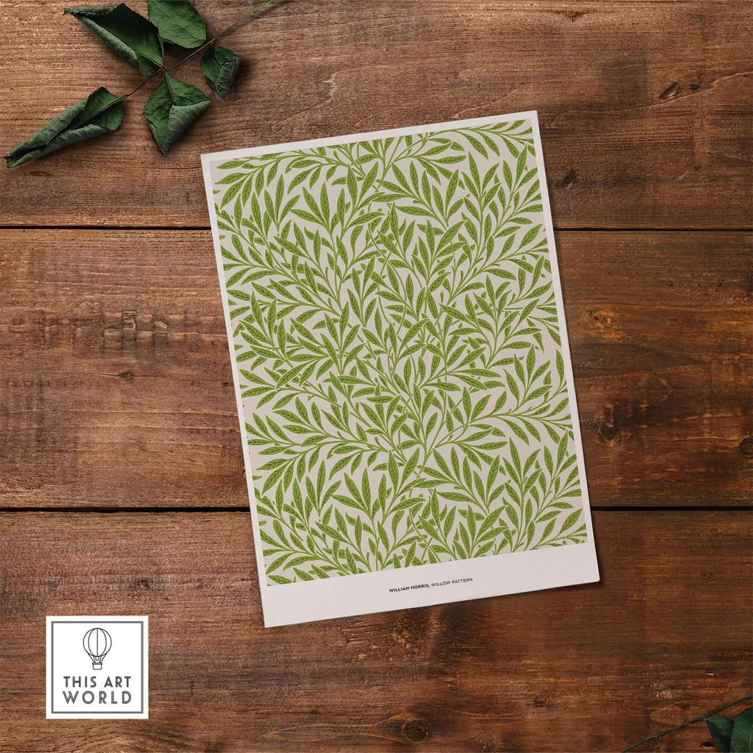 William Morris Willow Pattern green botanical art print on wooden background, showcasing intricate leaf design.