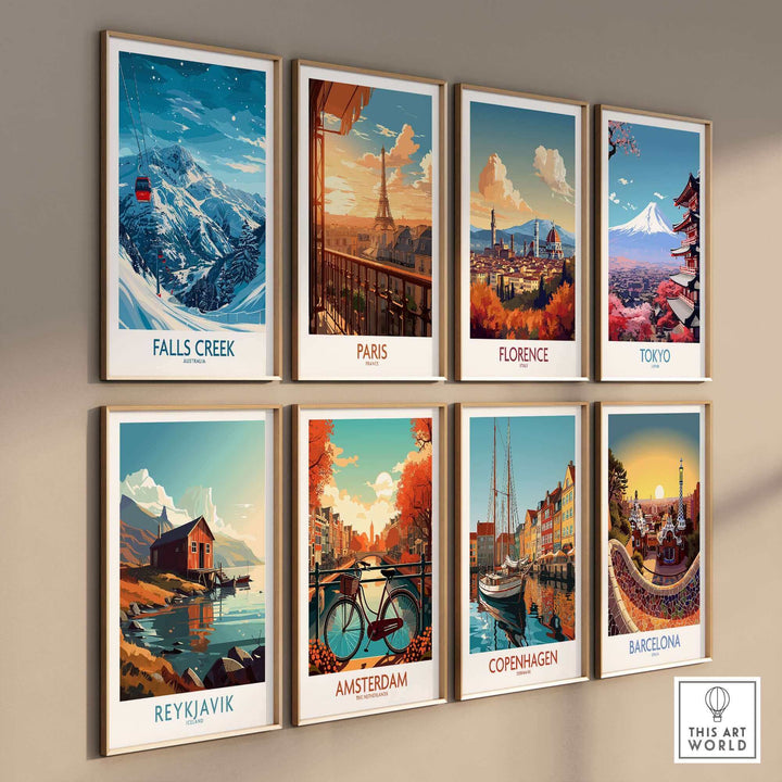 Eight travel-themed art prints on a wall, featuring Falls Creek, Paris, Florence, Tokyo, Reykjavik, Amsterdam, Copenhagen, and Barcelona.