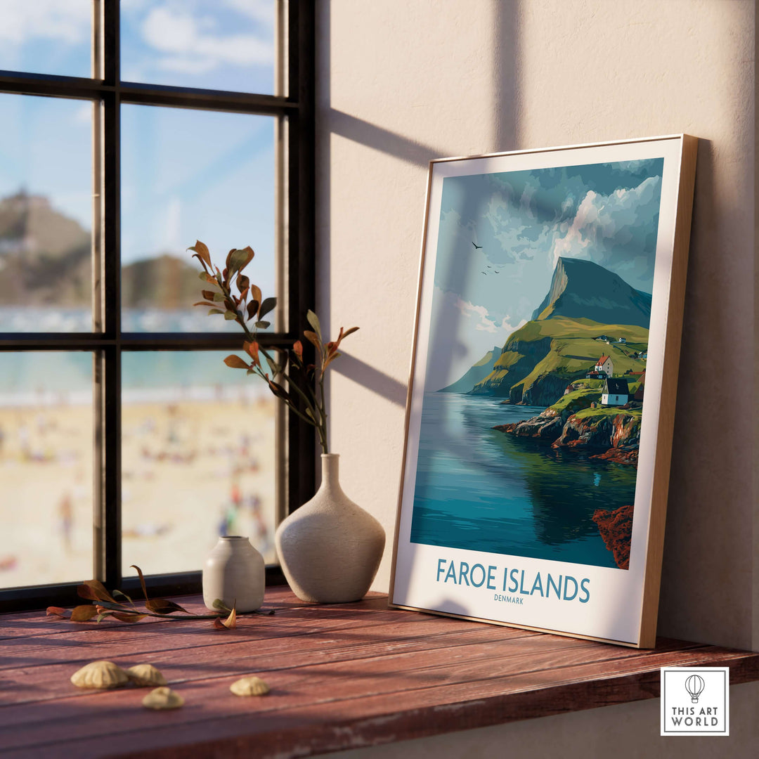 Faroe Islands Print | Dramatic Cliffs Travel Poster displayed in a cozy room with a beach view.