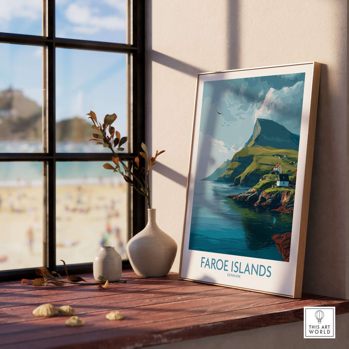 Faroe Islands Print | Dramatic Cliffs Travel Poster displayed in a cozy room with a beach view.