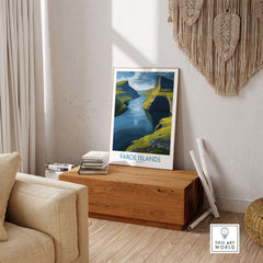 Faroe Islands Fjord Landscape Art Print showcasing serene waters and majestic landscapes in a cozy room setting.