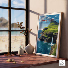 Faroe Islands Gásadalur Waterfall View Print | Nordic Nature Wall Decor displayed on a windowsill with beach view.