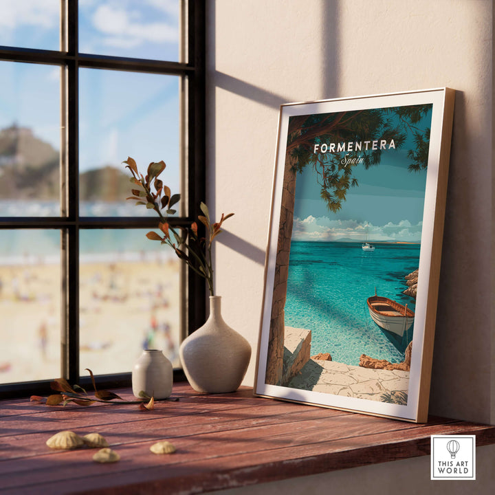 Formentera Balearic Island Seascape Print | Tranquil Coastal Decor framed on a wooden table by a window.