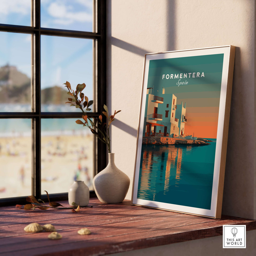 Formentera Coastal Building Reflection Print | Romantic Sea Wall Decor displayed on a table near a window with beach view.