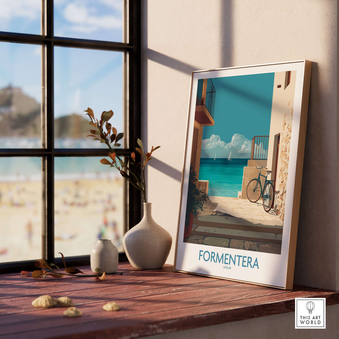 Formentera Spain Art Print | Balearic Coastal Decor Poster displayed near a window, showcasing its serene coastal beauty.