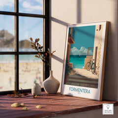 Formentera Spain Art Print | Balearic Coastal Decor Poster displayed by a window with beach view.