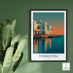 Formentera Spain Sunset White Houses Art Print | Balearic Island Poster framed on green wall with palm leaves.