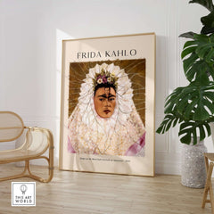 Frida Kahlo Diego on My Mind Tehuana Self Portrait Poster Art Print displayed in a stylish interior with plants and modern decor.