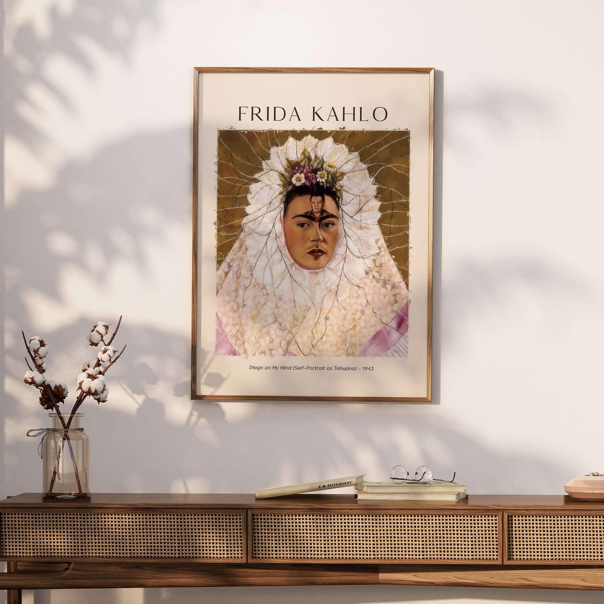 Frida Kahlo Diego on My Mind Tehuana Self Portrait Poster Art Print displayed on a wall above a wooden table.
