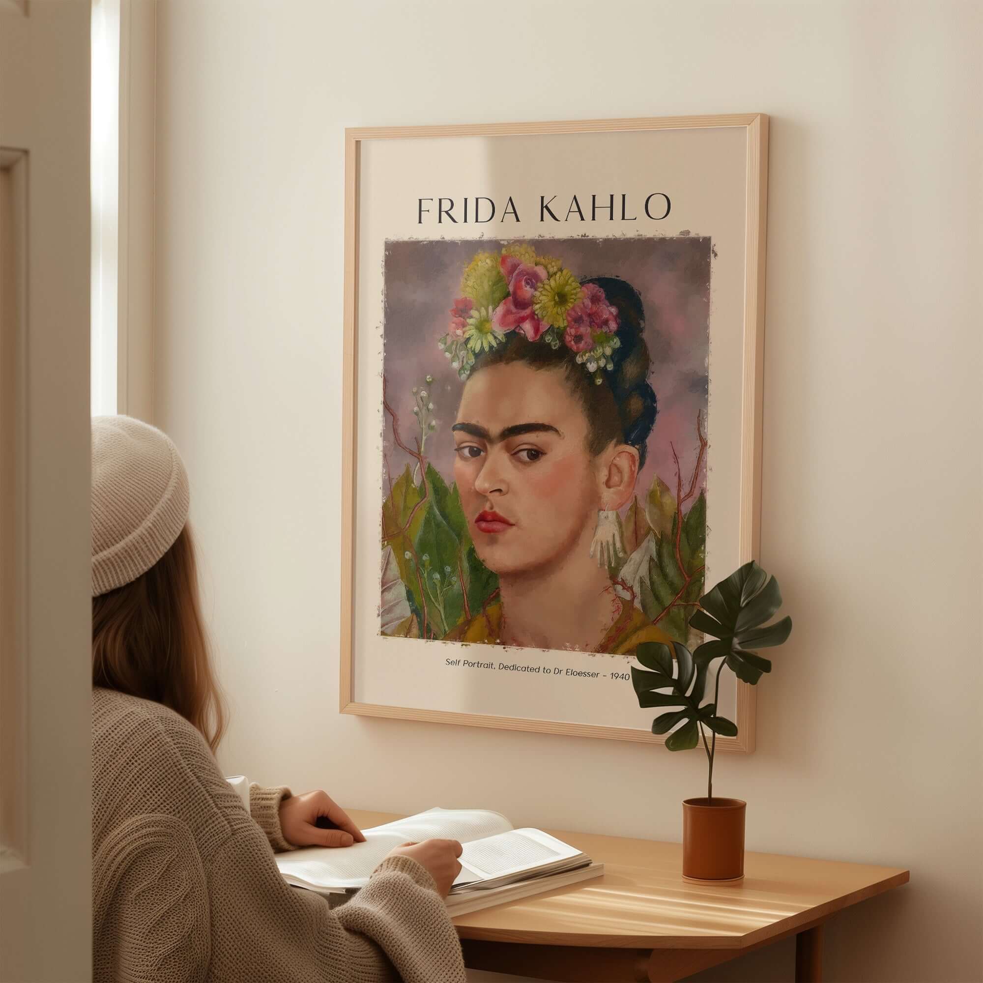 Frida Kahlo Self Portrait Dedicated Dr Eloesser Floral Poster Art Print displayed in a cozy room with a woman reading.