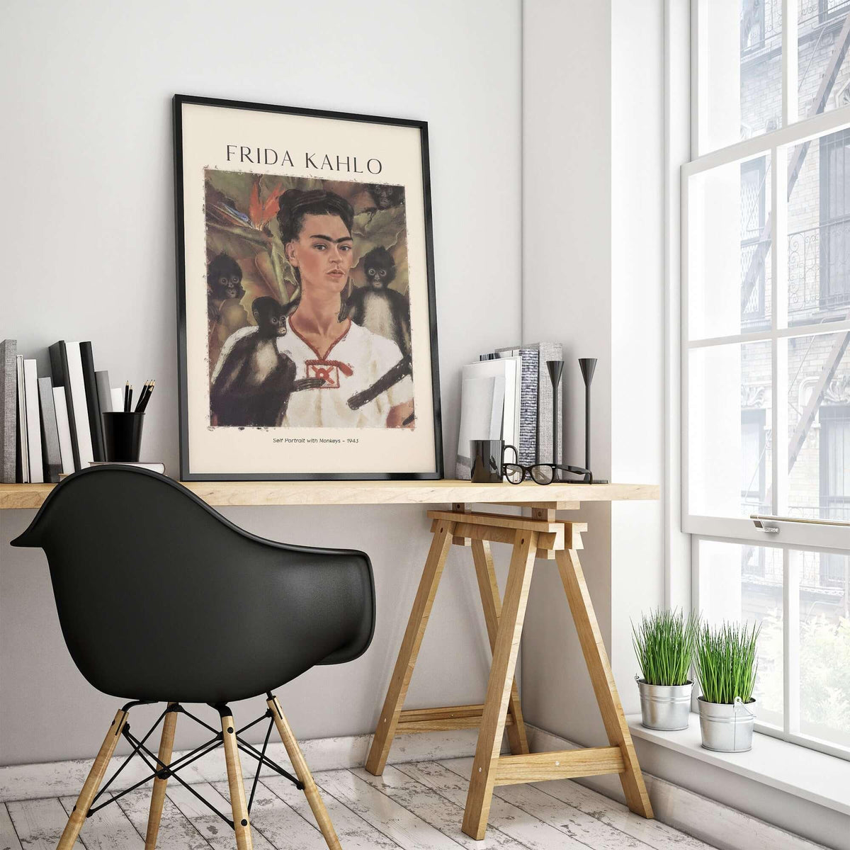 Frida Kahlo Self Portrait with Monkeys Famous Painting Poster Art Print displayed in a stylish home office setting.