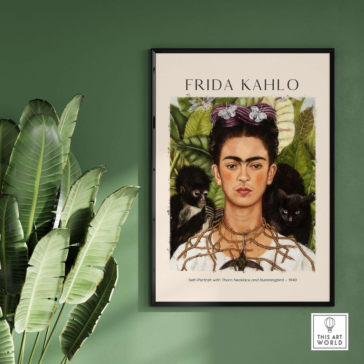 Frida Kahlo Self Portrait with Thorn Necklace and Hummingbird Print displayed on a wall with plants.