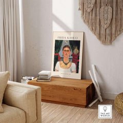 Frida Kahlo Self Portrait Time Flies 1929 Vintage Art Print Poster displayed in a modern living room setting.